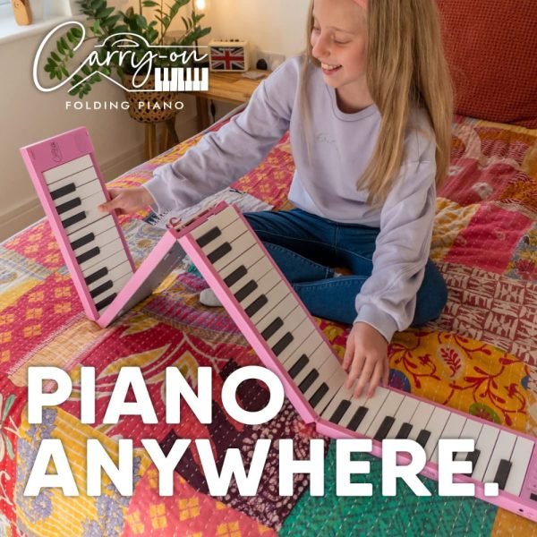 b4e1d71e9c869be56133005f5e7e68e6.jpeg Blackstar Carry-On Folding Piano 88 - Pink