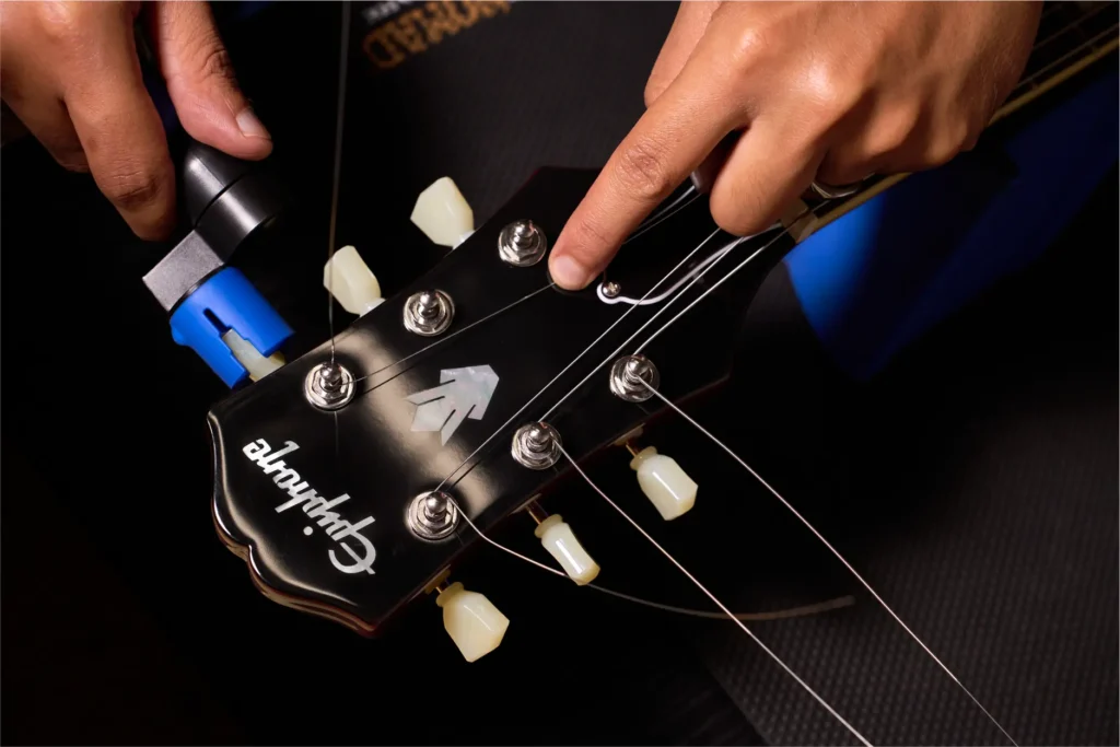 Guitar service workshop in Malaysia with tools and guitars at CK Music.